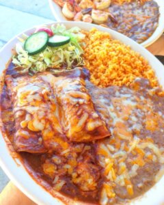 BEEF ENCHILADAS with extra cheese on top!!!